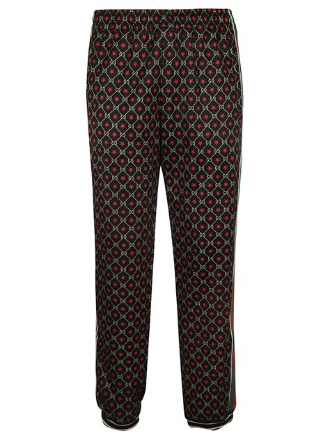 gucci all over print sweat pants